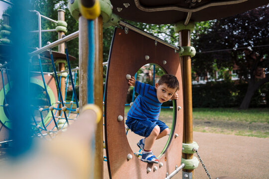 Boy at playground in weekend morning