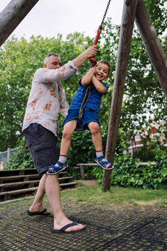 Father and son at playground