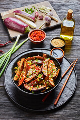Gaji Namul, spicy eggplant in a black bowl