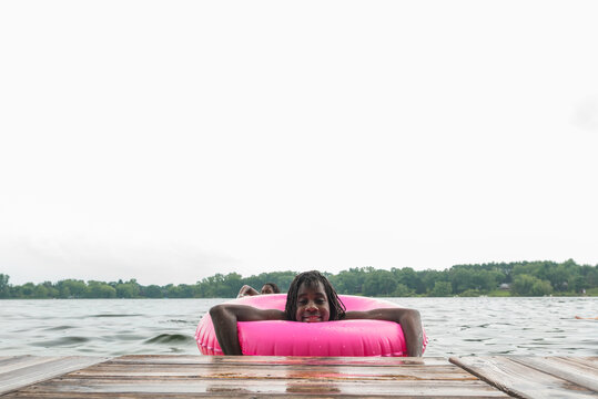 Smiling Black Girl With LifeSaver