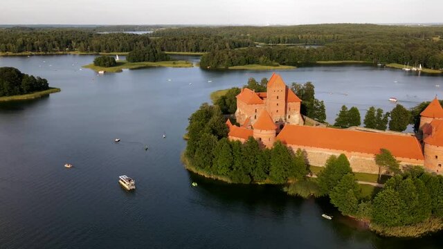 360 Hyperlapse of Trakai Island castle in Lithuania. Trakai island castle is lokated in Galve lake, Lithuania. Aerial hyperlapse of castle and plenty of ships, boats and other water transportation.
