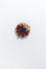 Healthy sandwich with blueberries, raspberries and banana
