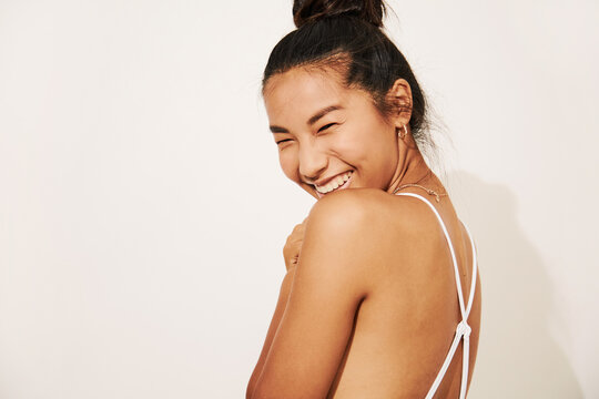 Cute Asian woman in bathing suit portrait