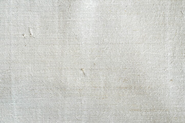 Texture of old homespun hemp fabric. Rough textile