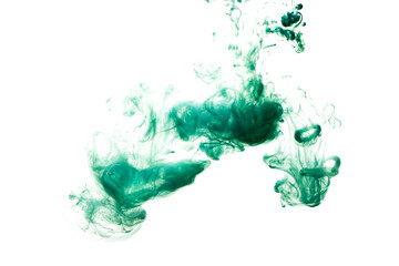 A cloud of green paint released into clear water. Isolate on a white background.