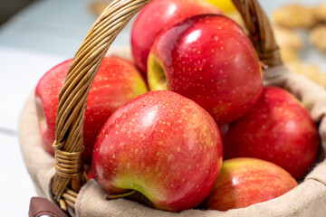 red apples in a basket close up
