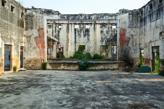 Large abandoned building without roof