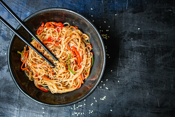 rice noodles with vegetables cellophane pasta second course food background top view copy space for text eating healthy