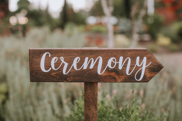 Wooden Sign Pointing to Wedding Ceremony