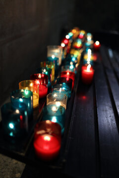 Lit candles in a church