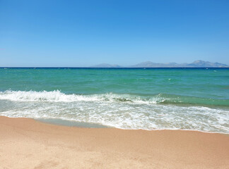 Blue sea and beach background. Aqua sea water surface. Sea surface view. Beach view.
