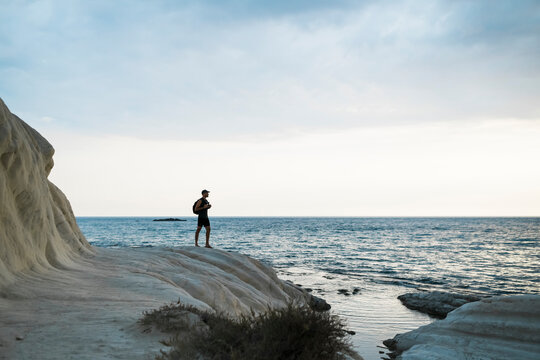 Silhouette of a man against the sea