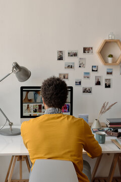 Unrecognisable Young Man Surfing Internet