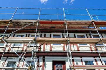 scaffolding at half-timbered house currently under renovation