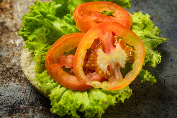 Tasty burger on rustic background
