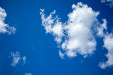 Fototapeta na wymiar Cumulus clouds against a blue sky.