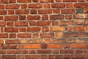 Naklejka premium Background of stone wall texture. The surface of the stones is brown