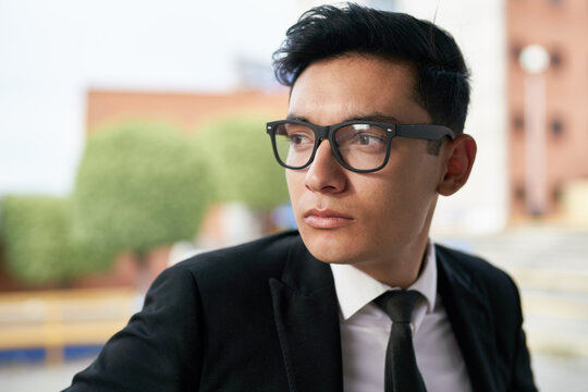 Attractive young businessman outdoors
