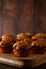 Muffins on a wooden cutting board. Traditional pastries for the holiday.