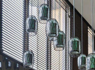 Modern decorative green predant lamps closeup.