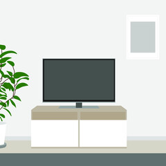 TV on the tv stand and a potted plant on the background of the wall with a picture