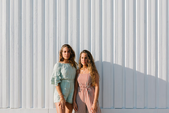 Portrait of two adorable girls looking at camera