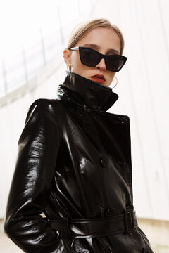 Portrait of beautiful blonde fashion model in black sunglasses