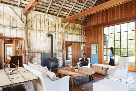 Multi-ethnic couple in farmhouse