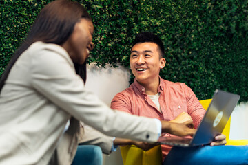 Group of young modern people planning strategy