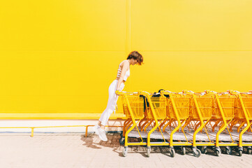Woman with shopping carts