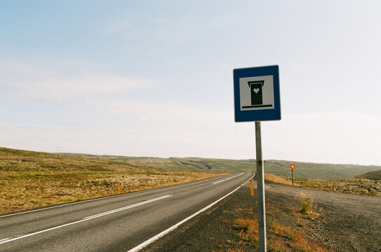Sign of a toilet next to the main road in Iceland
