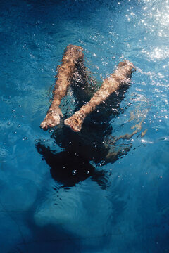 Beautiful woman swim in pool