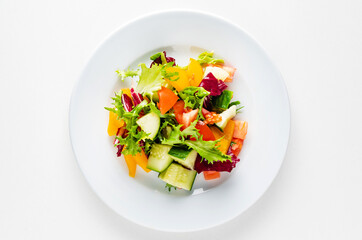 vegetable salad on the white plate