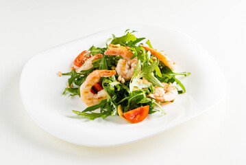 salad with shrimps, rocket salad and cherry tomatoes