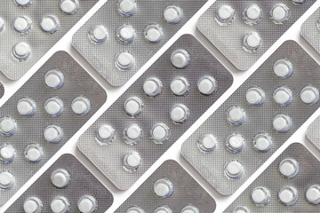 Foil blister packs with white tablets