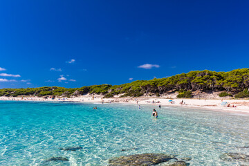 CALA AGULLA, MALLORCA, SPAIN - 21 July 2020: People enjoying summer on the popular beach on Mallorca,  Balearic Islands.