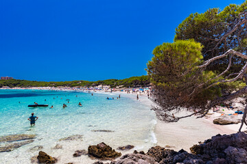 CALA AGULLA, MALLORCA, SPAIN - 21 July 2020: People enjoying summer on the popular beach on Mallorca,  Balearic Islands.