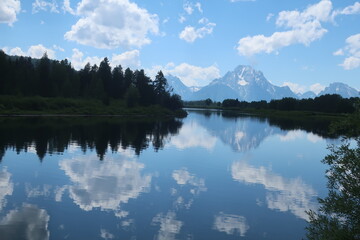 Reflective lake water with Mount Moran