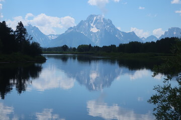 Reflective lake water in Tetons National Park in Wyoming