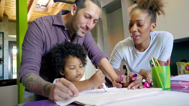 Family painting together at home