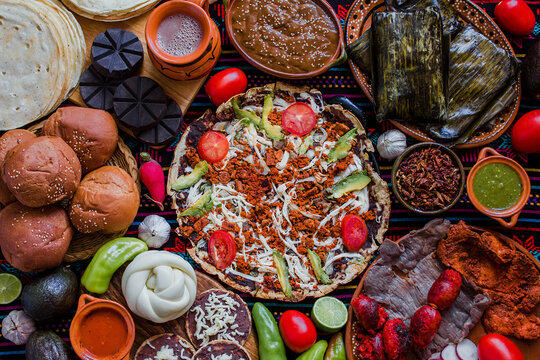 traditional Mexican food from Oaxaca Mexico, Tlayuda, Oaxaca Cheese, tamales and Chocolate - Powered by Adobe