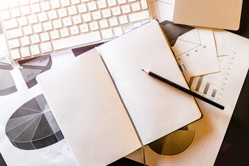 Statistical analysis process control. Finance diagrams and graphs in office table. Financial analytics workspace. Planner and Agenda Concept.