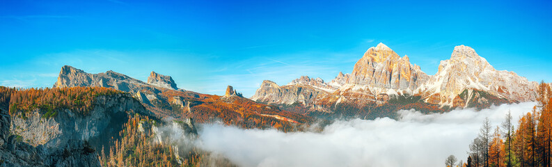 Astonishing autumn sunny landscape with View of Tofana di Rozes and Cinque Torri