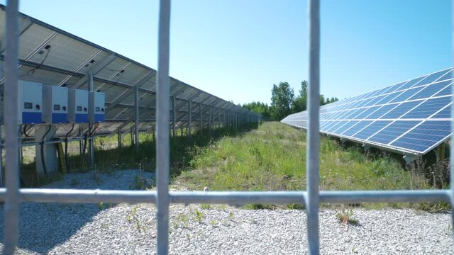 The metal fence of the solar panels inside