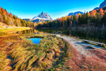 Astonishing view of popular travel destination mountain lake Antorno in autumn