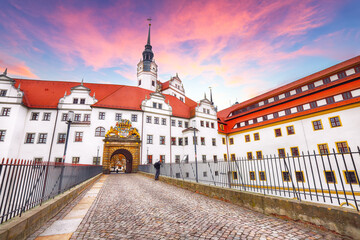 Astonishing autumn view of Hartenfels castle on banks of the Elbe