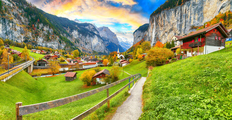 Amazing autumn landscape of touristic alpine village Lauterbrunnen