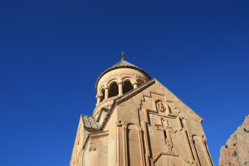 Beautiful Noravank armenian monastery and church, orange, with a colorful blue sky, Armenia