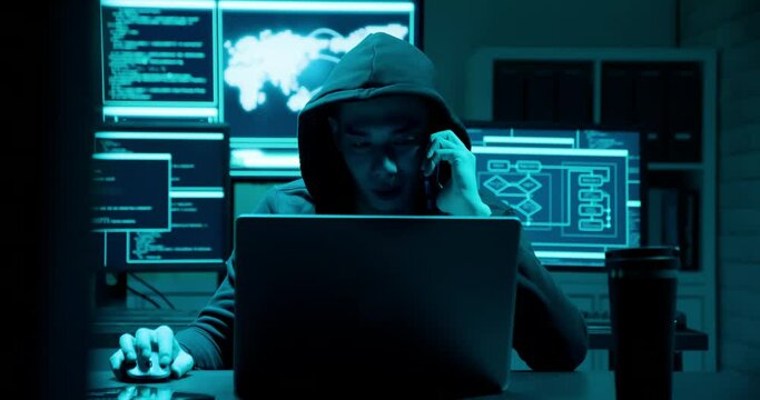 Asian male hacker extorting