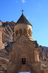 Fototapeta na wymiar Beautiful Noravank armenian monastery and church, orange, with a colorful blue sky, Armenia